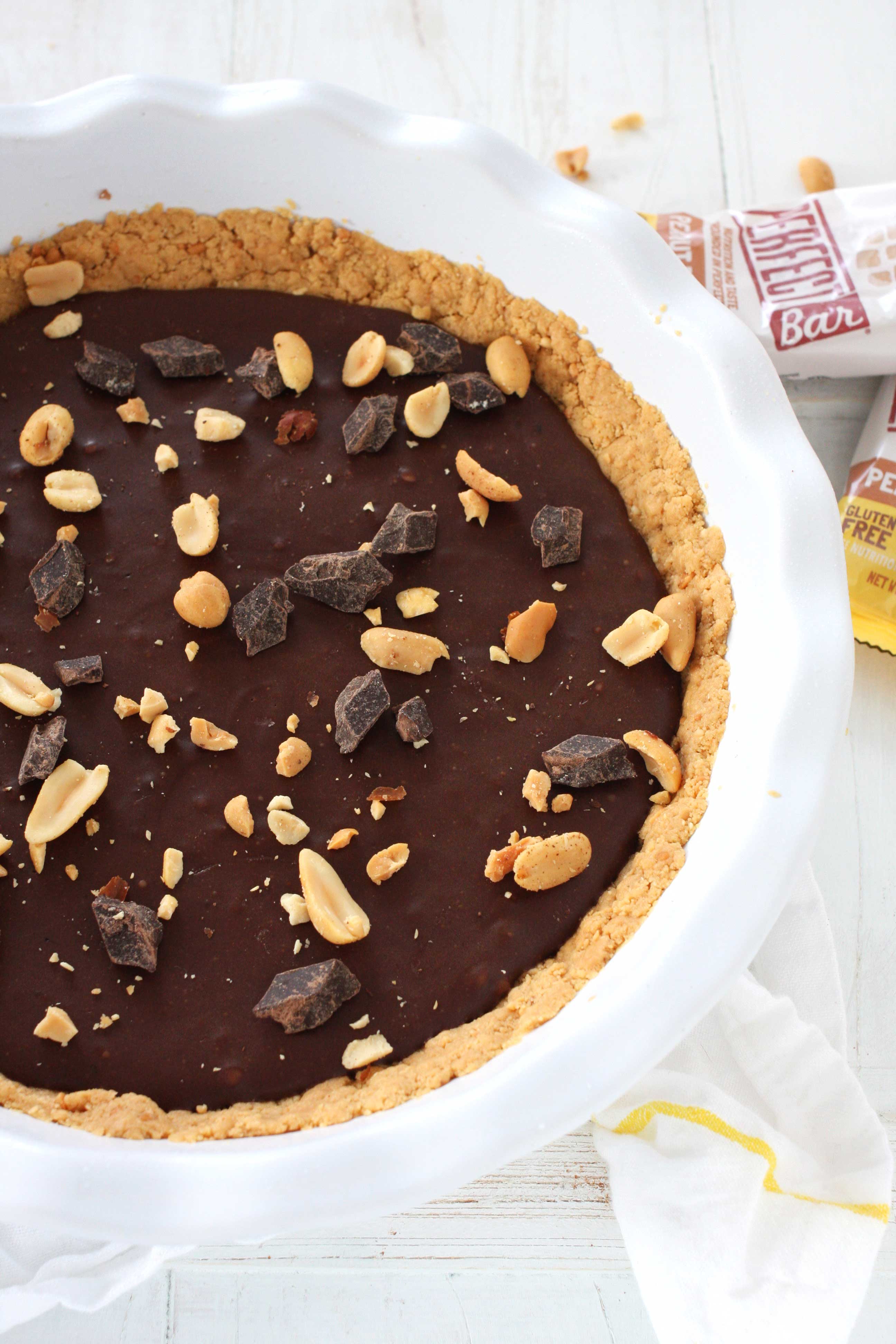 No Bake Chocolate Peanut Butter Pie // A delicious and mostly healthy no-bake chocolate peanut butter pie made with Perfect Bars for the crust and coconut cream for a rich filling #sponsored #chocolate #peanutbutter #nobake